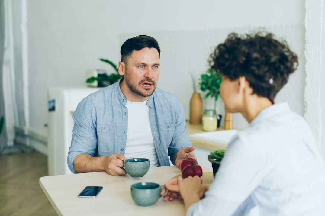 two people talking calmly
