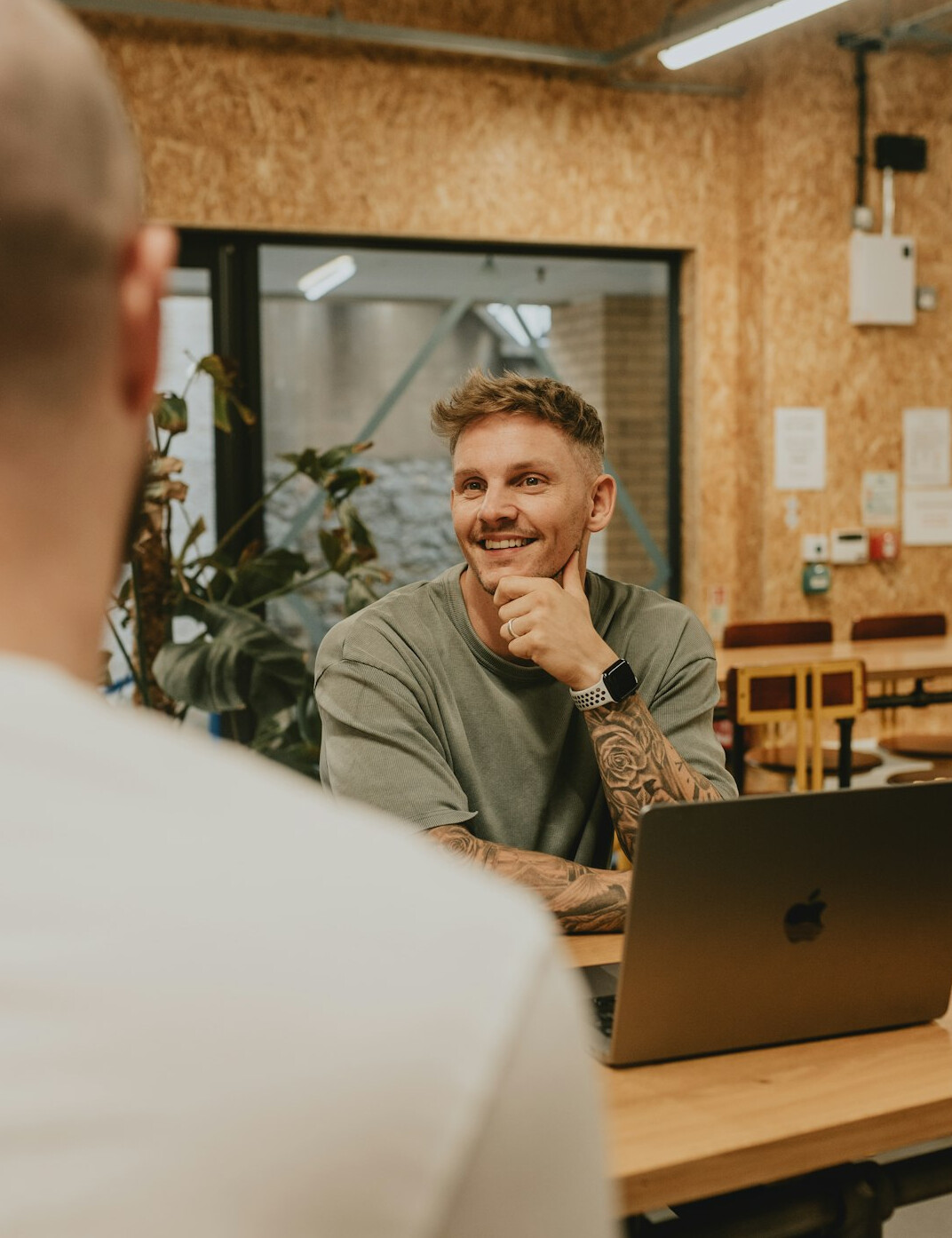 person speaking confidently in meeting