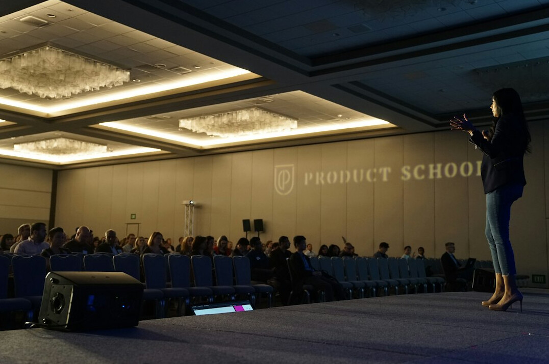 confident speaker on stage