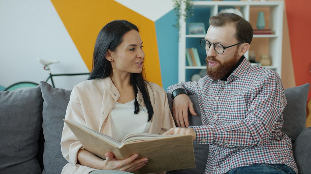 man reading book on communication