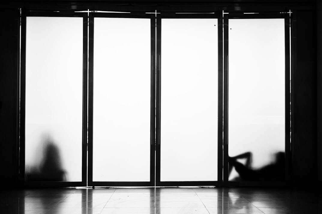 person meditating in quiet space