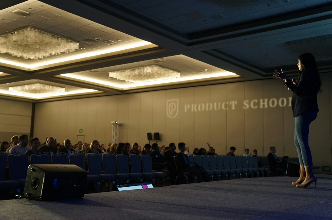 confident speaker on stage